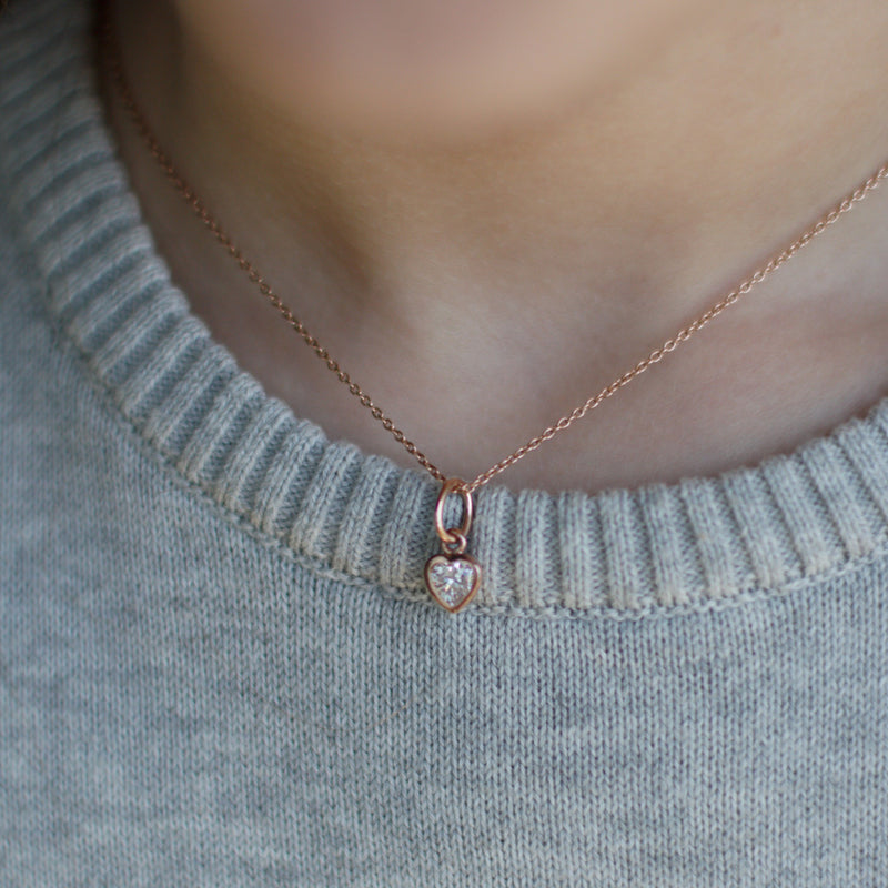 Girl wearing Children's Necklace in Rose Gold with Sparkle Heart Pendant CZ